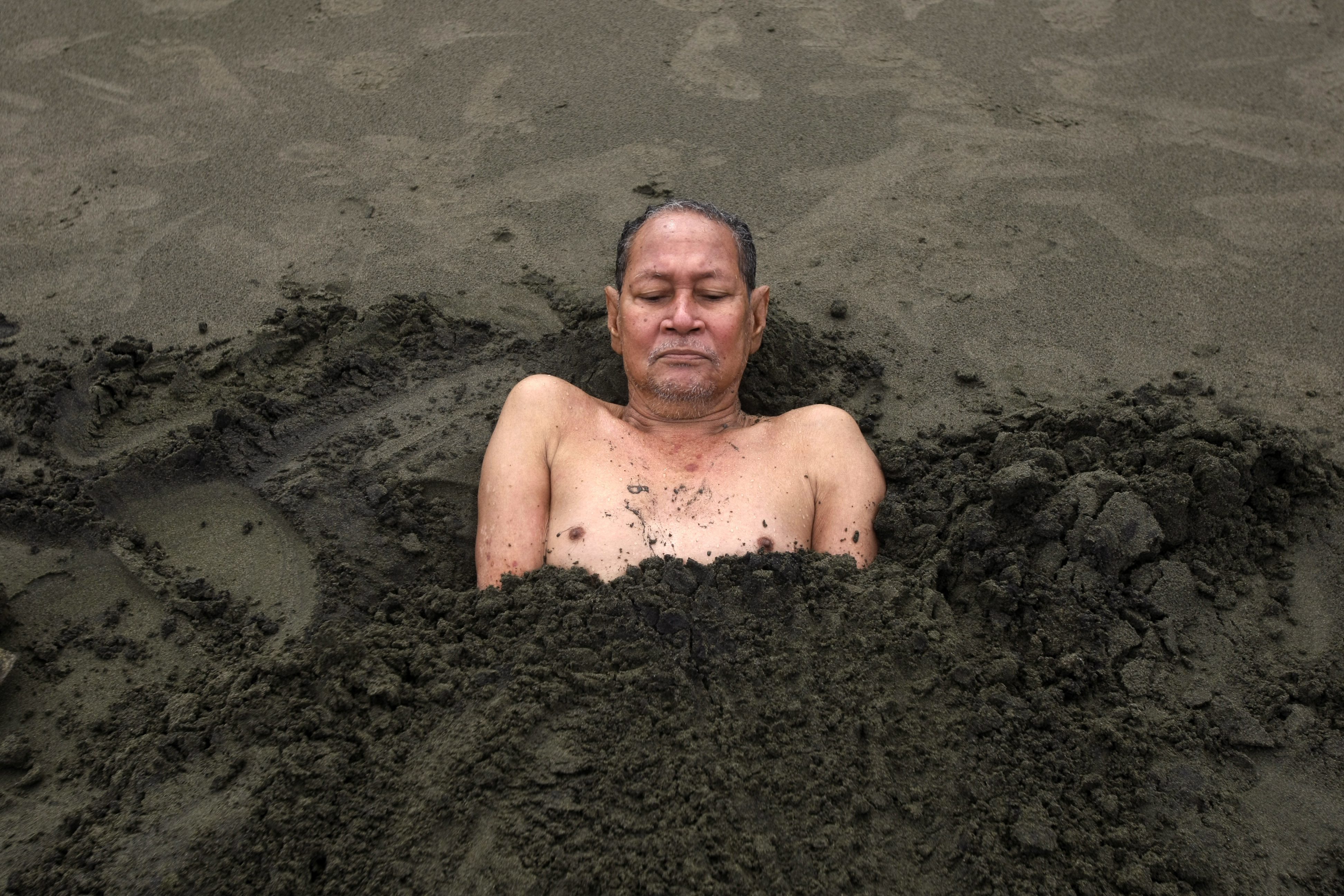 Femdom Men Buried In Sand